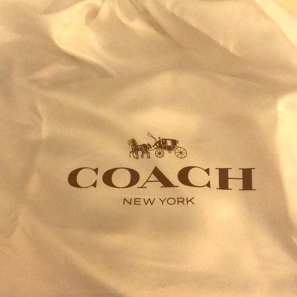 A fabric COACH bag.